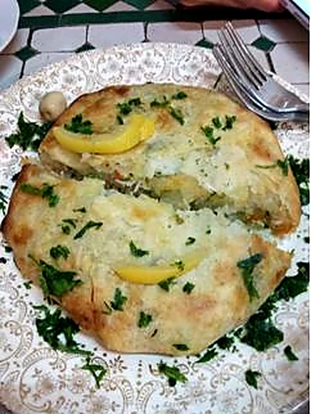 Round Moroccan pastilla served at Fassie Délice