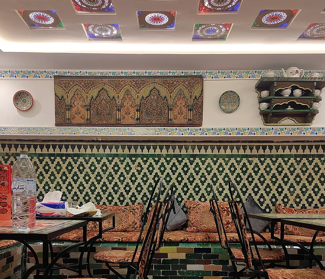 Zellige-lined dining room at Fassie Délice in Fès